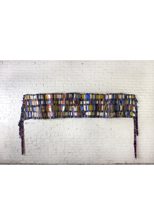 <em>Donna, Discarded objects, handwoven fabric and oil on canvas, 36x140”(width may vary depending on the folds in the cloth), 2013. </em>